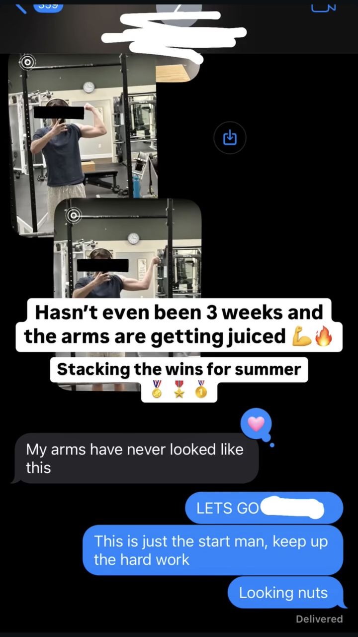 Client flexing in a gym mirror under three weeks in, texting that his arms have never looked like this.